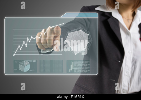 Businesswoman working with digital virtual screen Stock Photo