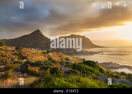 Panoramic view from Victoria Road over Llandudno and Sandy Bay at sunset, Cape Peninsula Stock Photo