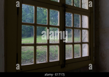 Window in former stable of Château de la Roche-Guyon, France Stock Photo