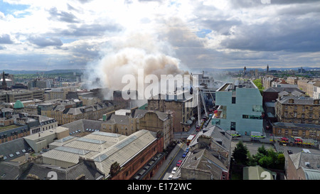 Glasgow School of Art's Mackintosh building in Glasgow Scotland on fire with fire fighters fighting the flames inside & outside. Stock Photo