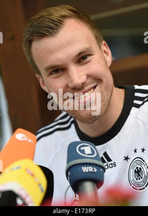 Passeier, Italy. 25th May, 2014. Kevin Großkreutz smiles during an interview while attending the 'media day' of the German national soccer team at the team hotel in St. Leonhard in Passeier, Italy, 25 May 2014. Germany's squad prepares for the upcoming FIFA World Cup 2014 in Brazil at a training camp in South Tyrol until 30 May 2014. Photo: Andreas Gebert/dpa/Alamy Live News Stock Photo