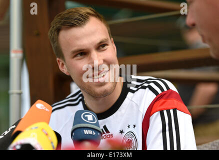 Passeier, Italy. 25th May, 2014. Kevin Großkreutz reacts during an interview while attending the 'media day' of the German national soccer team at the team hotel in St. Leonhard in Passeier, Italy, 25 May 2014. Germany's squad prepares for the upcoming FIFA World Cup 2014 in Brazil at a training camp in South Tyrol until 30 May 2014. Photo: Andreas Gebert/dpa/Alamy Live News Stock Photo