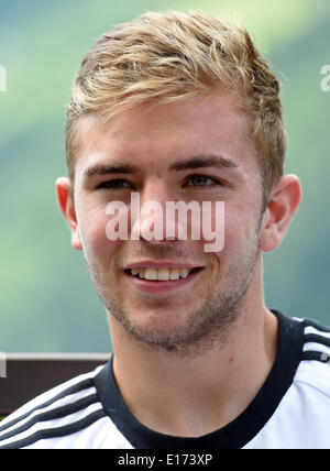 Passeier, Italy. 25th May, 2014. Christoph Kramer smiles during an interview at the «media day» of the German national soccer team at the team hotel in St. Leonhard in Passeier, Italy, 25 May 2014. Germany's squad prepares for the upcoming FIFA World Cup 2014 in Brazil at a training camp in South Tyrol until 30 May 2014. Photo: Andreas Gebert/dpa/Alamy Live News Stock Photo