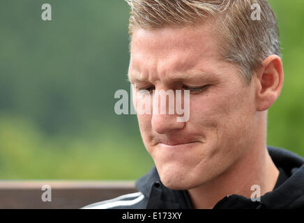 Passeier, Italy. 25th May, 2014. Bastian Schweinsteiger attends an interview at the 'media day' of the German national soccer team at the team hotel in St. Leonhard in Passeier, Italy, 25 May 2014. Germany's squad prepares for the upcoming FIFA World Cup 2014 in Brazil at a training camp in South Tyrol until 30 May 2014. Photo: Andreas Gebert/dpa/Alamy Live News Stock Photo