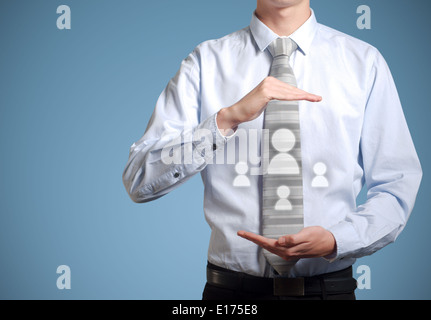 Businessman holding social media people icons in hands Stock Photo