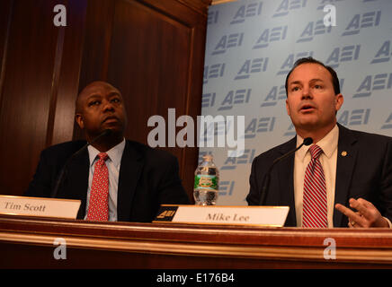 May 22, 2014 - Washington, District of Columbia, US - Senator TIM SCOTT (R-SC) and Senator MIKE LEE during a conversation at the American Enterprise Institute in Washington DC, Thursday. Conservatives thinkers and politicians, discussed on the book ''Room to Grow: Conservative Reforms for a Limited Government and a Thriving Middle Class'', on ocassion of the 50th anniversary of Lyndon Johnson's Great Society speech. (Credit Image: © Miguel Juarez Lugo/ZUMAPRESS.com) Stock Photo