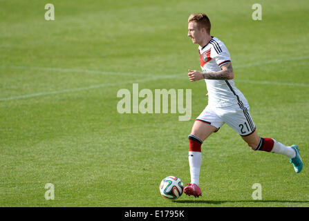 Passeier, Italy. 25th May, 2014. Marco Reus of the German national soccer team in action during a friendly match against the German U20 team on a training ground at St. Leonhard in Passeier, Italy, 25 May 2014. Germany's national soccer squad prepares for the upcoming FIFA World Cup 2014 in Brazil at a training camp in South Tyrol until 30 May 2014. Photo: Andreas Gebert/dpa/Alamy Live News Stock Photo