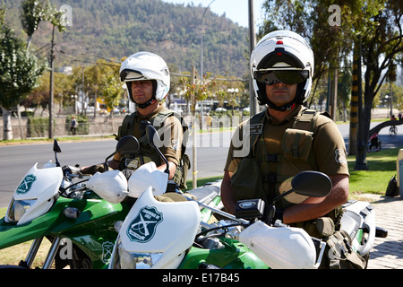 two carabineros de chile national police officers with roads closed ...