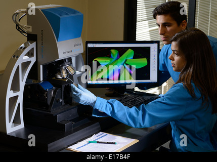 Scientists using an Alicona InfiniteFocus 3D surface measurement device Stock Photo