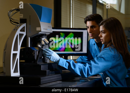 Scientists using an Alicona InfiniteFocus 3D surface measurement device Stock Photo