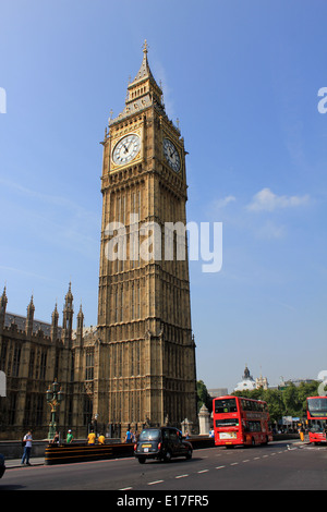 Big Ben and the Houses of Parliament, with a black taxi and red double-decker bus on Westminster Bridge, London, England, UK Stock Photo