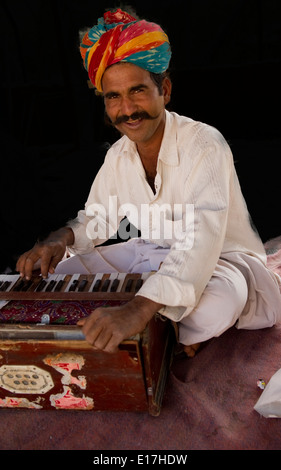 Manganiyar - a musician community performing at a village near Udaipur, India. Folk Musician Rural Indian villager - Rajasthan. Stock Photo