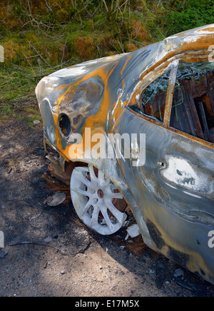 Burned-out car. Scout Scar carpark, Underbarrow Road, Kendal, Cumbria, England, United Kingdom, Europe. Stock Photo