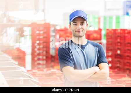 Portrait of worker in food processing plant Stock Photo