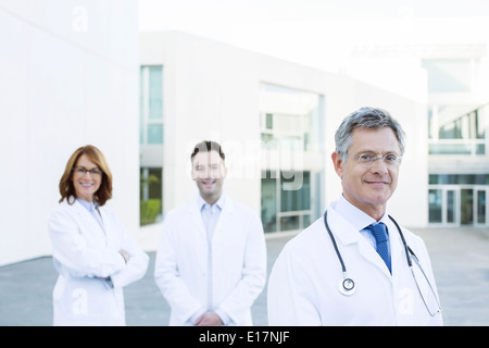 Portrait of confident doctors on rooftop Stock Photo