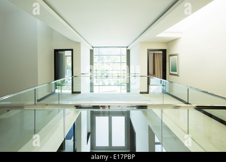Modern balcony and open foyer in luxury home Stock Photo