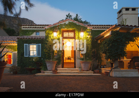 Luxury villa illuminated at night Stock Photo