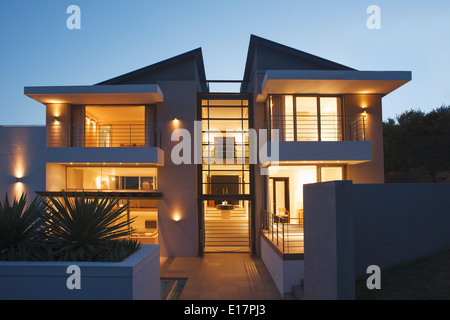 Modern house illuminated at night Stock Photo