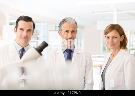 Portrait of confident scientists in laboratory Stock Photo