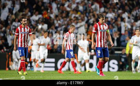 Adrian Lopez (Atletico Madrid #7) and Gabi (Atletico Madrid #14) upset after the goal of Sergio Ramos (Real Madrid CF #4) during the final of the Champions league between Real Madrid and Atletico Madrid, Estadio da Luz in Lisbon on May 24., 2014. Stock Photo