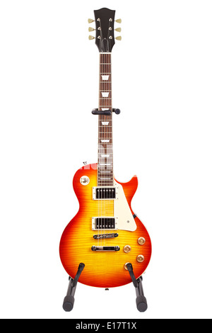 sunburst electric guitar on stand, isolated on white background Stock Photo