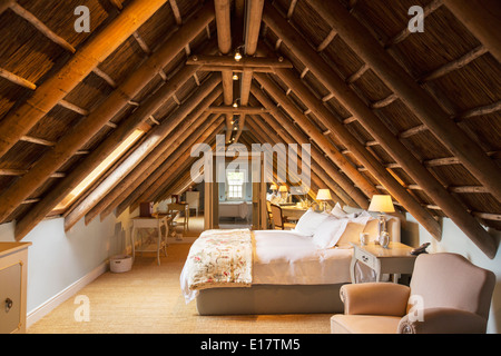 Luxury attic bedroom Stock Photo