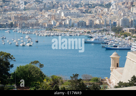 Looking from Valletta city walls, from Hastings gardens, to Manoel Island, Sliema, northern Malta, Europe. Stock Photo