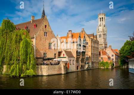 Belfry of Bruges towers over the buildings at the junction of the Groenerei and Dijver canals, Bruges, Belgium Stock Photo