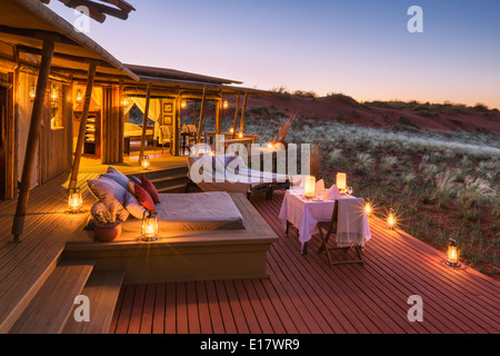 Romantic dining on deck area of mountain view suite.Dunes lodge.Wolwedans NamibRand Nature Reserve.Namibia Stock Photo