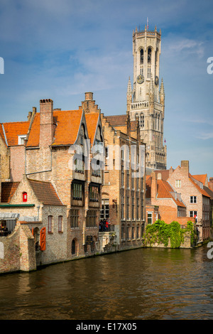 Belfry of Bruges towers over the buildings at the junction of the Groenerei and Dijver canals, Bruges, Belgium Stock Photo