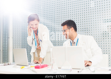 Scientists working in laboratory Stock Photo