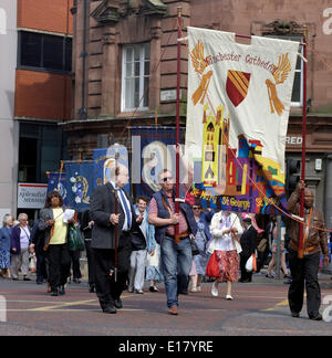 Manchester, UK 26th May 2014 Christians take part in the Manchester and Salford Annual Procession of Witness (the Whit Walk) from Manchester Cathedral to the Town Hall in Albert Square. Manchester and Salford Whit Walk Manchester, UK Credit:  John Fryer/Alamy Live News Stock Photo