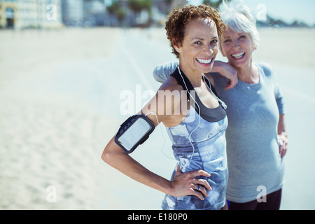 Portrait of smiling women in sportswear outdoors Stock Photo