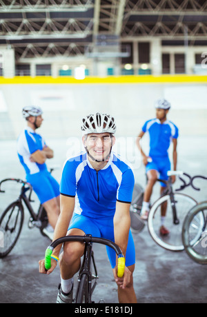 Portrait of track cyclist in velodrome Stock Photo