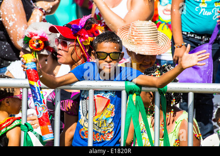 Barranquilla, Colombia - March 1, 2014 - Spectators watch the Battalia de Flores parade during the Carnival de Barranquilla. Stock Photo
