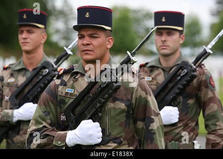 French Marines stand in honor during a ceremony to mark the 96th anniversary of the historic Battle of Belleau Wood and Memorial Day at Aisne-Marne American Cemetery May 24, 2014 in Belleau, France. Stock Photo