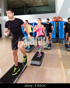 Cardio step dance people group at fitness gym training workout Stock Photo  - Alamy