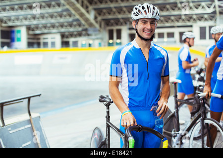 Portrait of track cyclist in velodrome Stock Photo