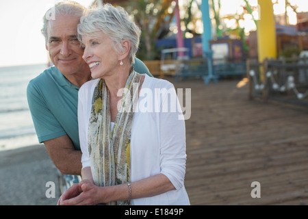 Senior couple at amusement park Stock Photo