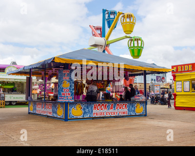 A hook a duck stall at a fairground Stock Photo