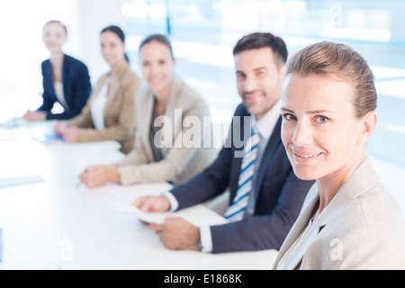 Portrait of confident business people in conference room Stock Photo