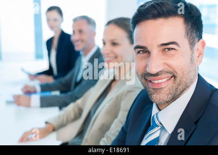Portrait of confident businessman in conference room Stock Photo
