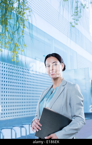 Portrait of confident businesswoman outdoors Stock Photo