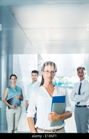 Portrait of confident business people in office Stock Photo