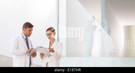 Doctors talking in hospital Stock Photo