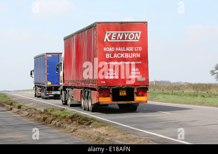 TwoTrucks traveling along the A417 dual carriageway in The Cotswolds, England Stock Photo