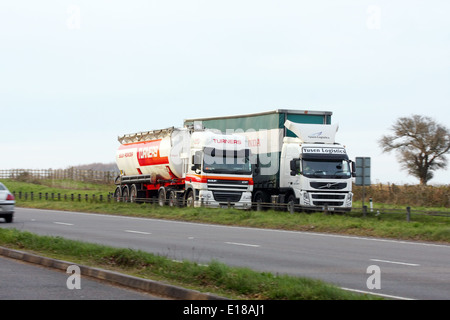 Trucks traveling along the A417 dual carriageway in The Cotswolds, England Stock Photo