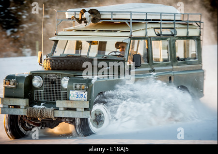 Land Rover Series 2a driving in snow. Fallston, Maryland, USA Stock Photo