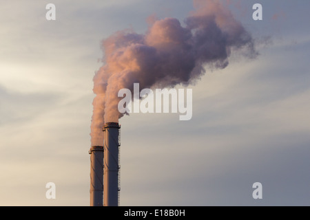 Smoke emission from factory pipes Stock Photo