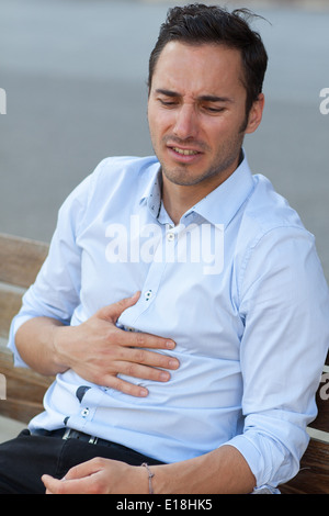 man suffering from stomachache Stock Photo